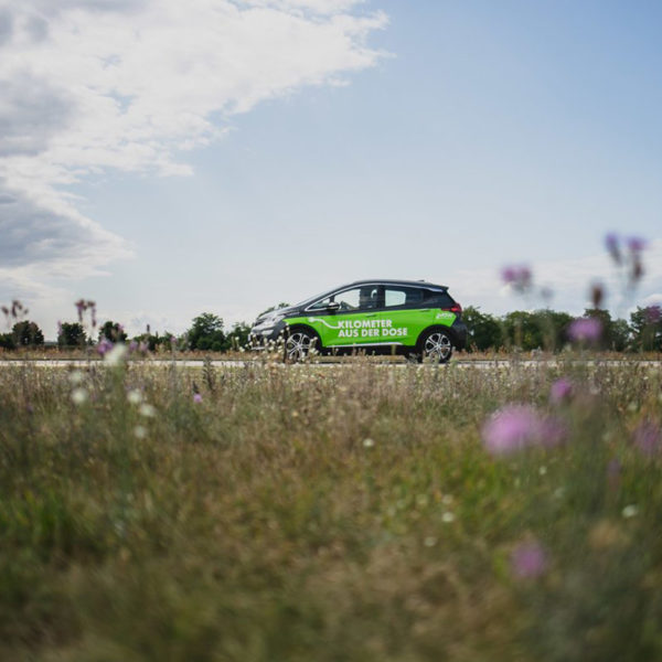 Battery-electric passenger vehicle on the street